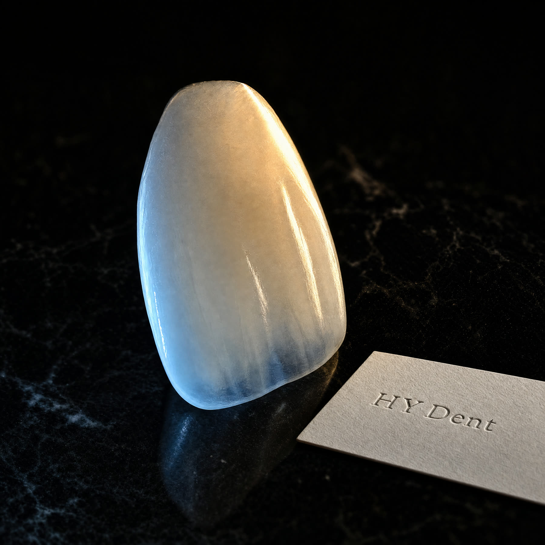 Ivoclar laminate veneer macro shot with HY Dent clinic label